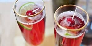 Cranberry Pomegranate Bellinis with Lime ~ can be made with champagne or seltzer, perfect during the holidays or for New Year's | {Five Heart Home}