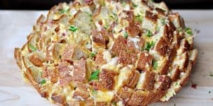 Cheesy Pull-Apart Bread with Bacon, Garlic, Cheddar and Swiss ~ the ultimate snack for your Super Bowl party! | FiveHeartHome.com
