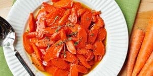 Honey-Glazed Carrots with Thyme and Lemon ~ a perfect spring side dish, and a gorgeous addition to your Easter menu! | FiveHeartHome.com