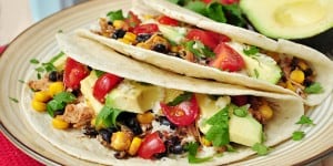 Slow Cooker Chicken and Black Bean Tacos ~ let your crock pot do all of the work on your next taco night! | FiveHeartHome.com