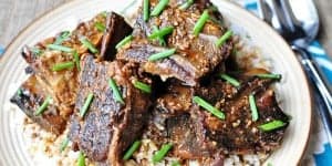 Slow Cooker Asian Beef Short Ribs ~ tender, savory beef from the crock pot, flavored with garlic, ginger, and sesame oil | FiveHeartHome.com