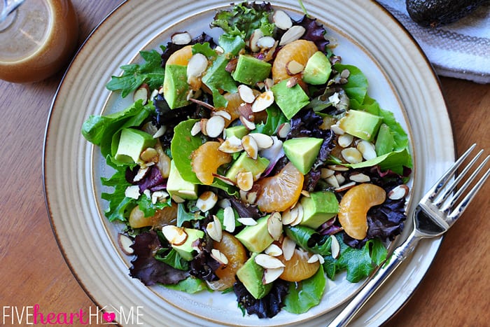 https://www.fivehearthome.com/wp-content/uploads/2013/10/Mixed-Greens-Salad-with-Mandarins-Toasted-Almonds-and-Sesame-Ginger-Vinaigrette-by-Five-Heart-Home_700pxHorizAerial.jpg