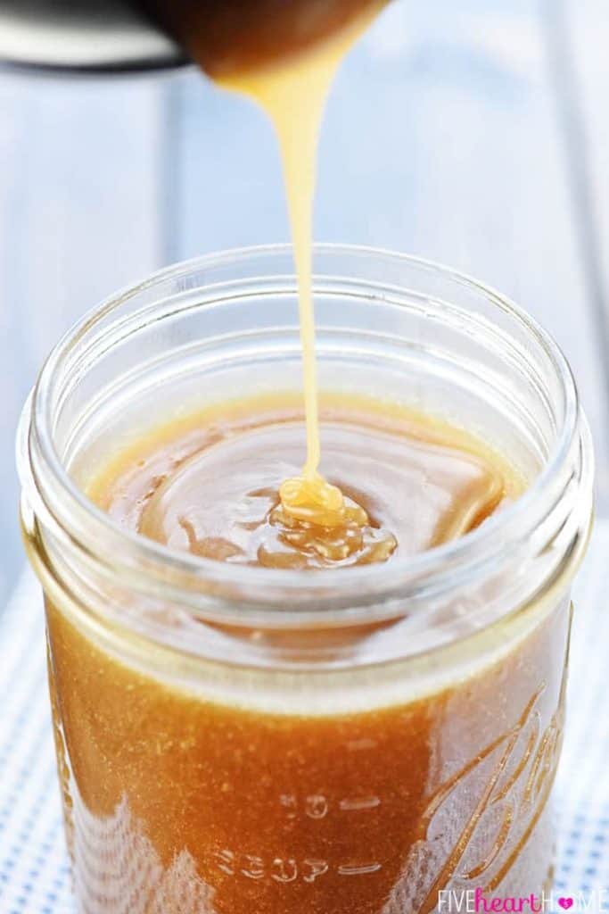 Caramel Sauce being poured into jar.