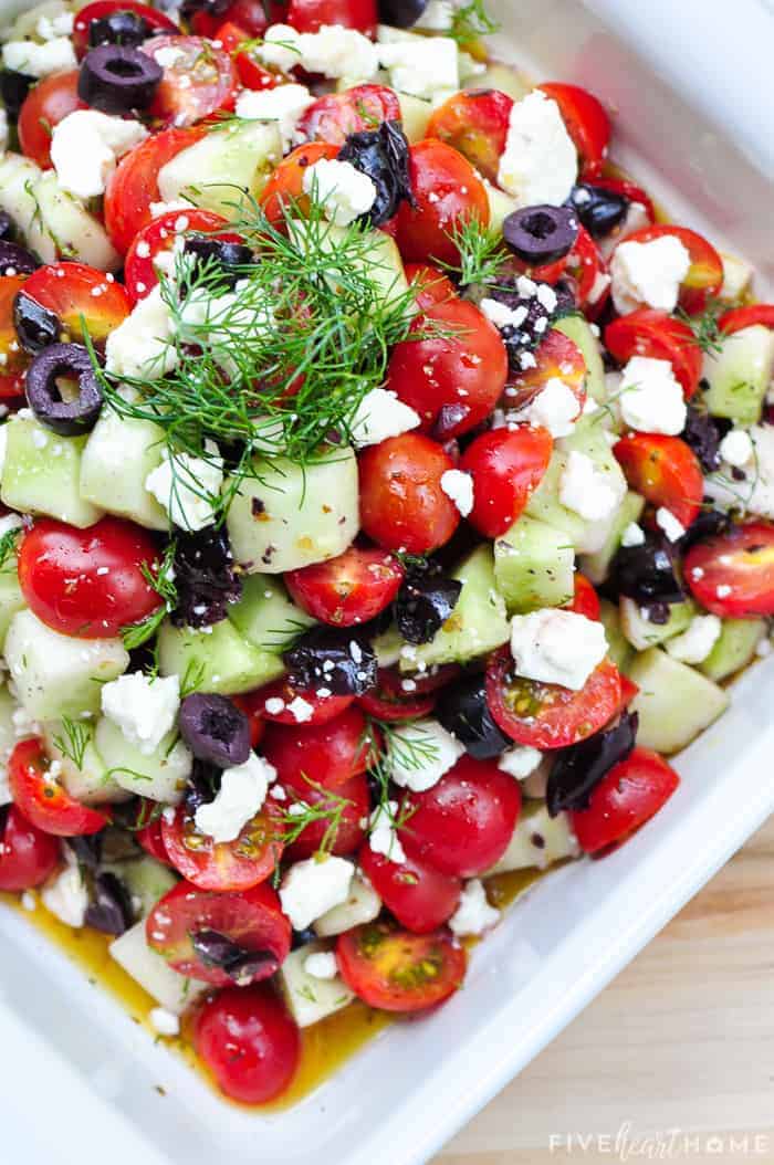 https://www.fivehearthome.com/wp-content/uploads/2019/05/Tomato-Cucumber-Salad-with-Olives-Dill-Feta-Recipe-by-Five-Heart-Home_700px-3.jpg