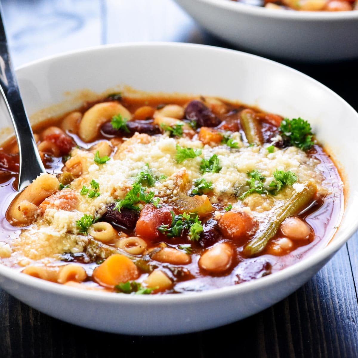 Minestrone Soup in white bowl.