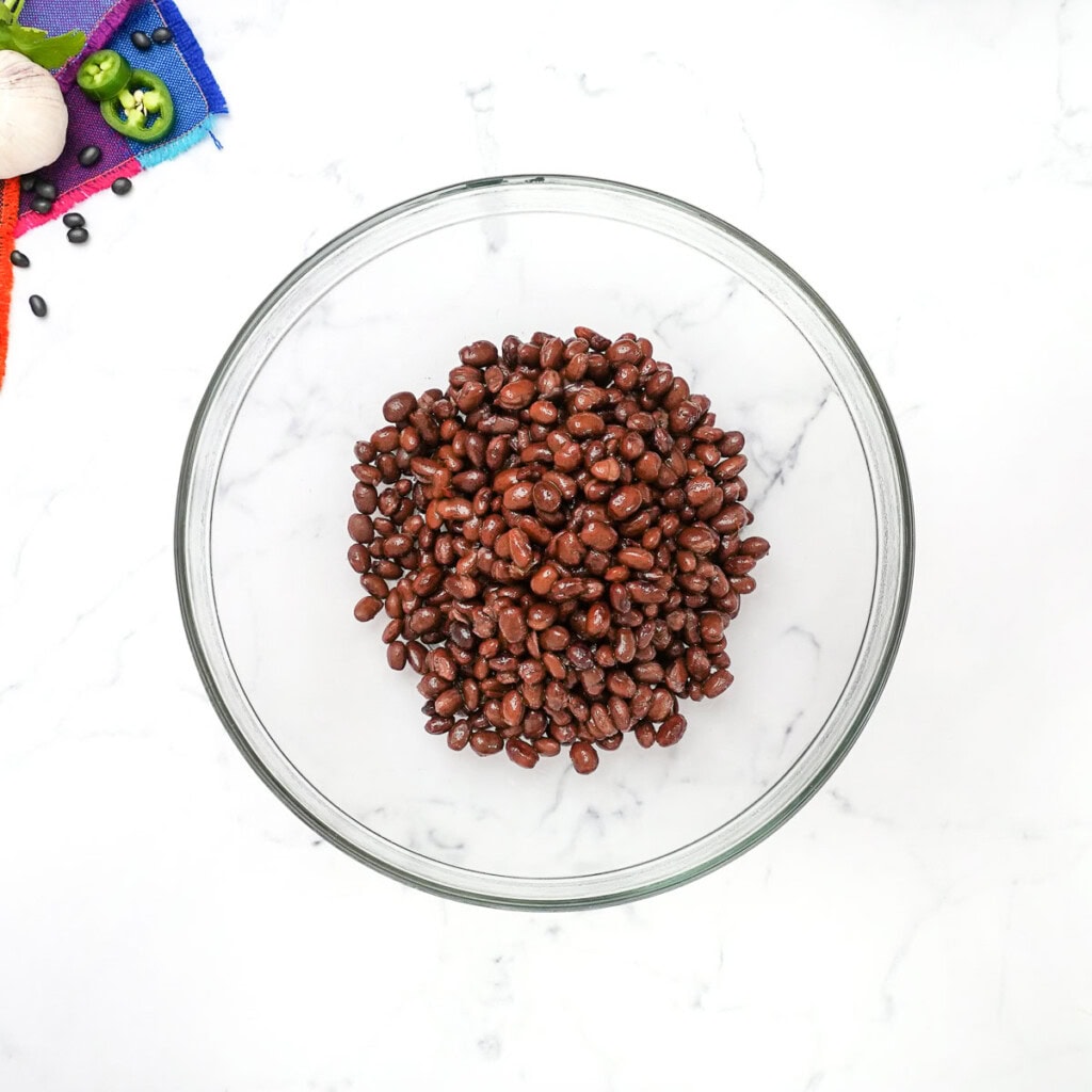 Rinsed and drained black beans in bowl.