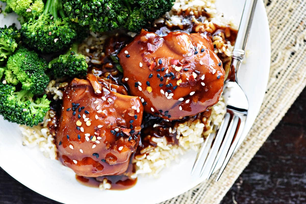 Close-up of Instant Pot Teriyaki Chicken sprinkled with sesame seeds.