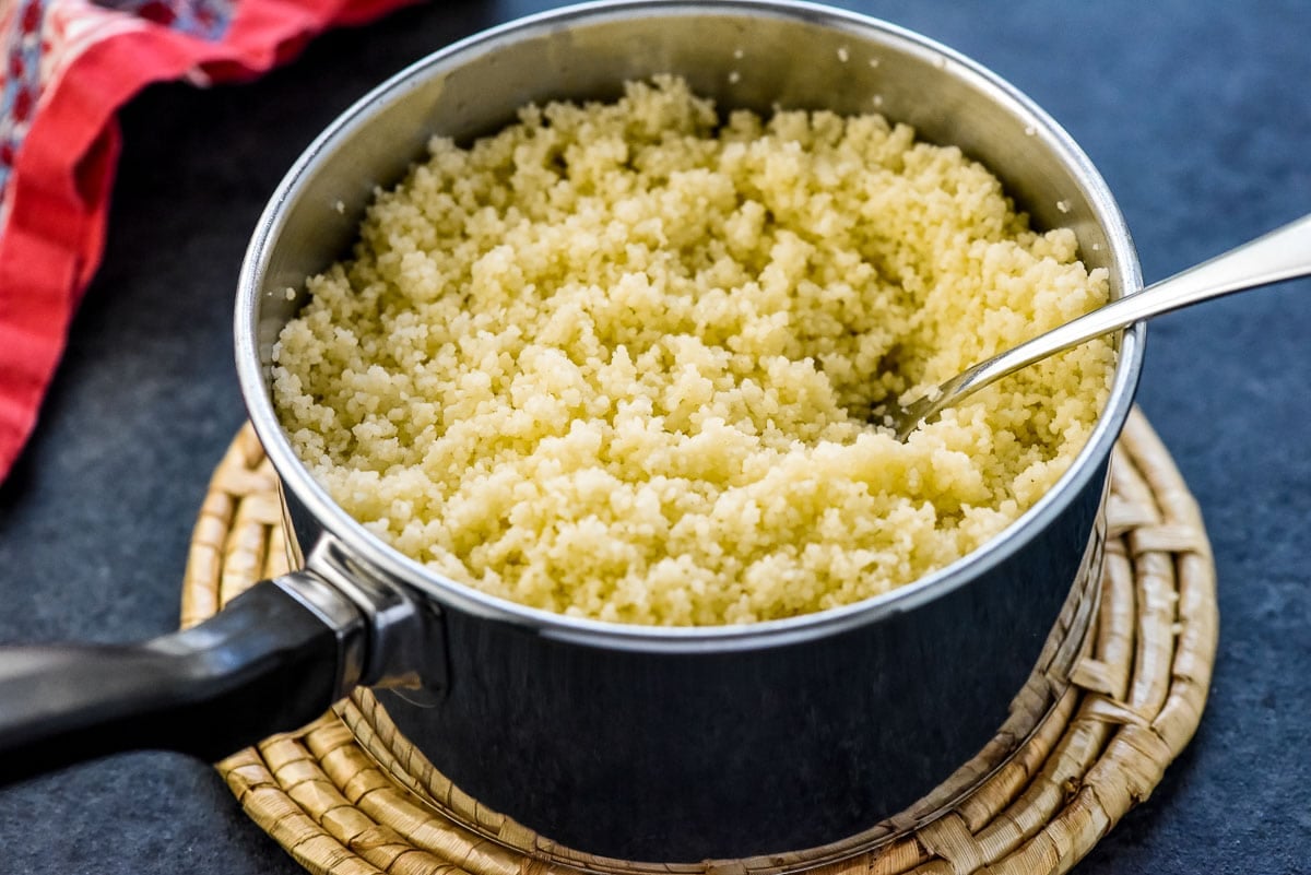 How to cook couscous and then fluff it with a fork.
