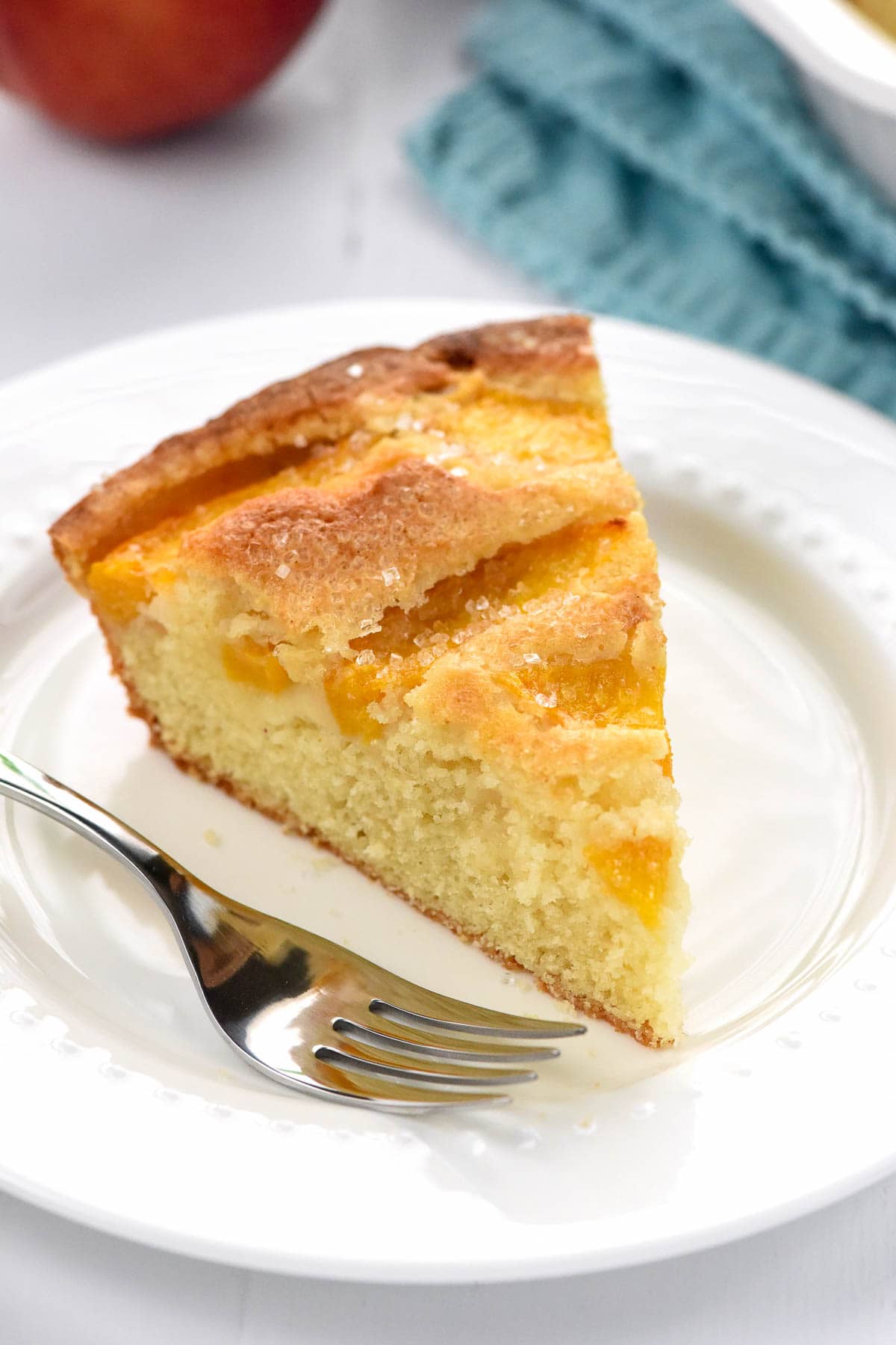Peach Cake serving with fork.