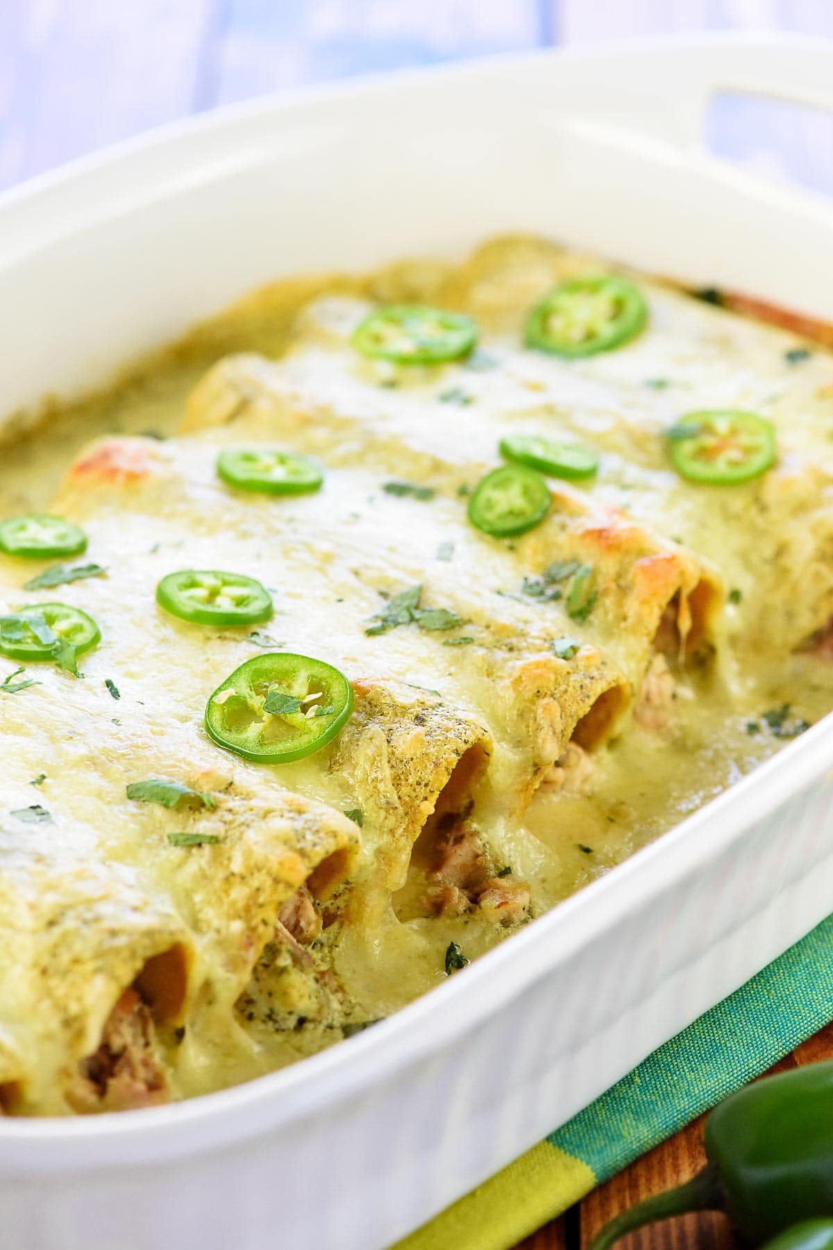 White Chicken Enchiladas with melted cheese.