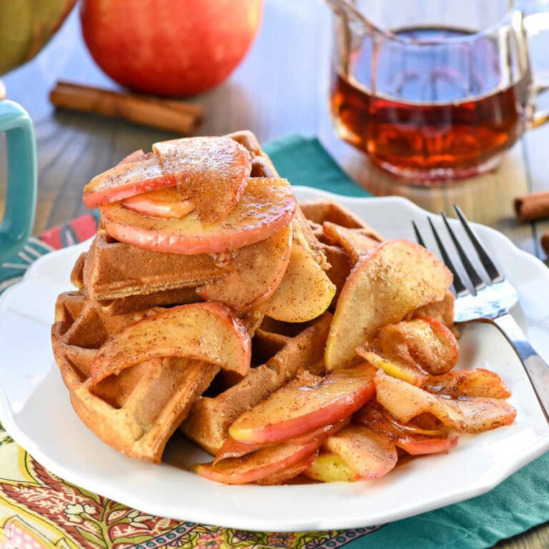 Apple Cinnamon Waffles on plate with fork.