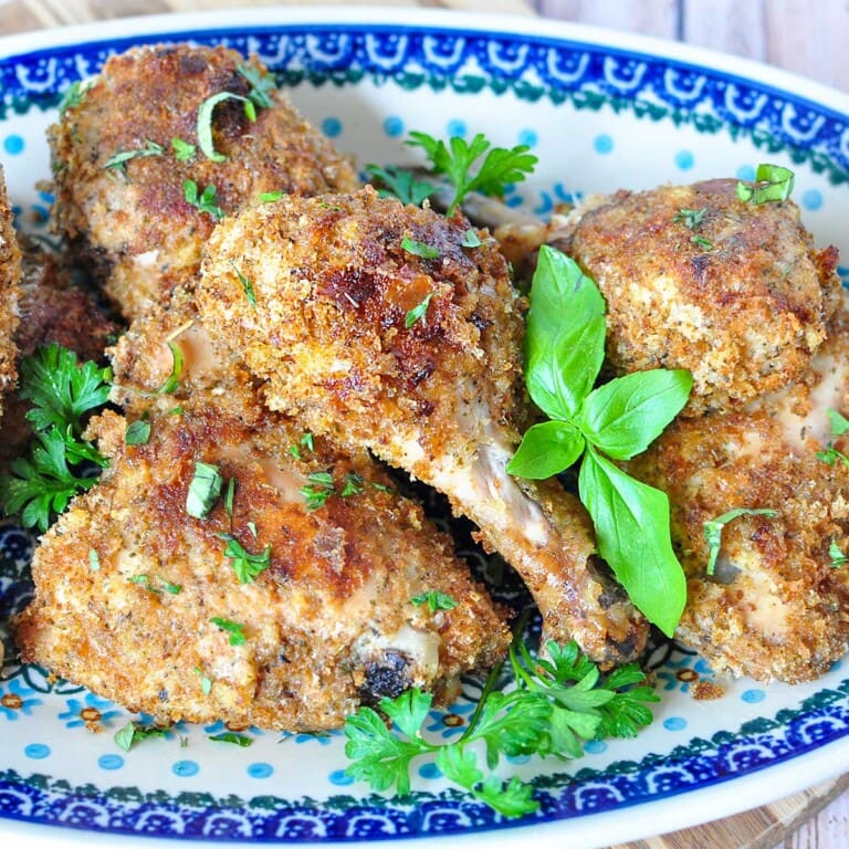 Baked Italian Chicken and blue and white platter.