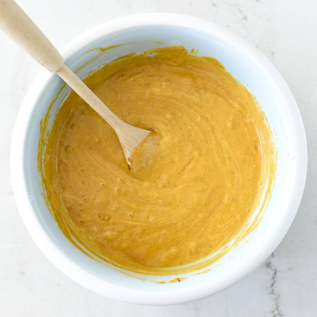 Yogurt blended into Healthy Pumpkin Muffins batter.