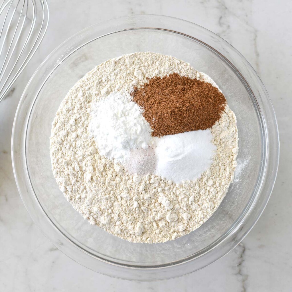 Dry ingredients in bowl for Healthy Pumpkin Muffins recipe.