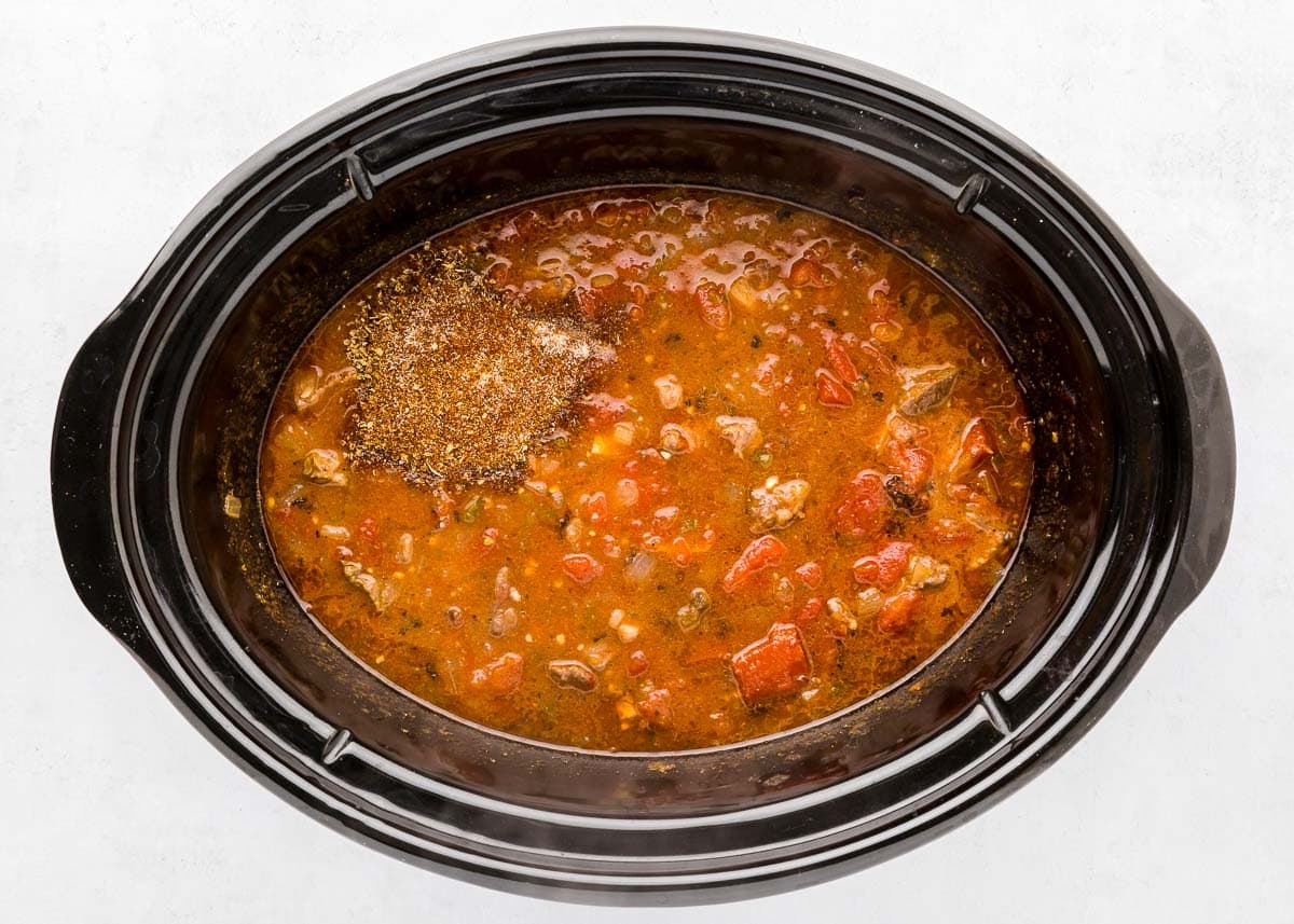 Adjusting spices for award winning Texas Chili recipe.