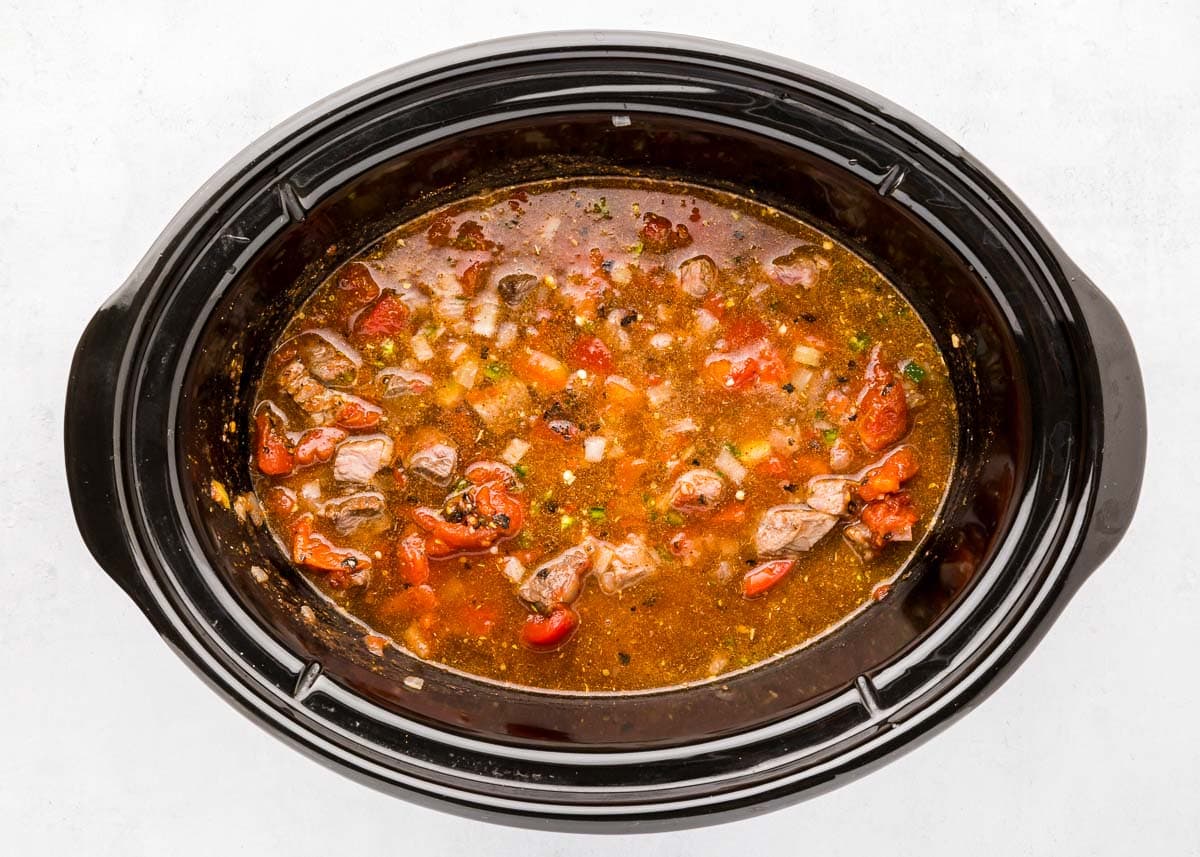 Liquid added to slow cooker for Texas Chili recipe.