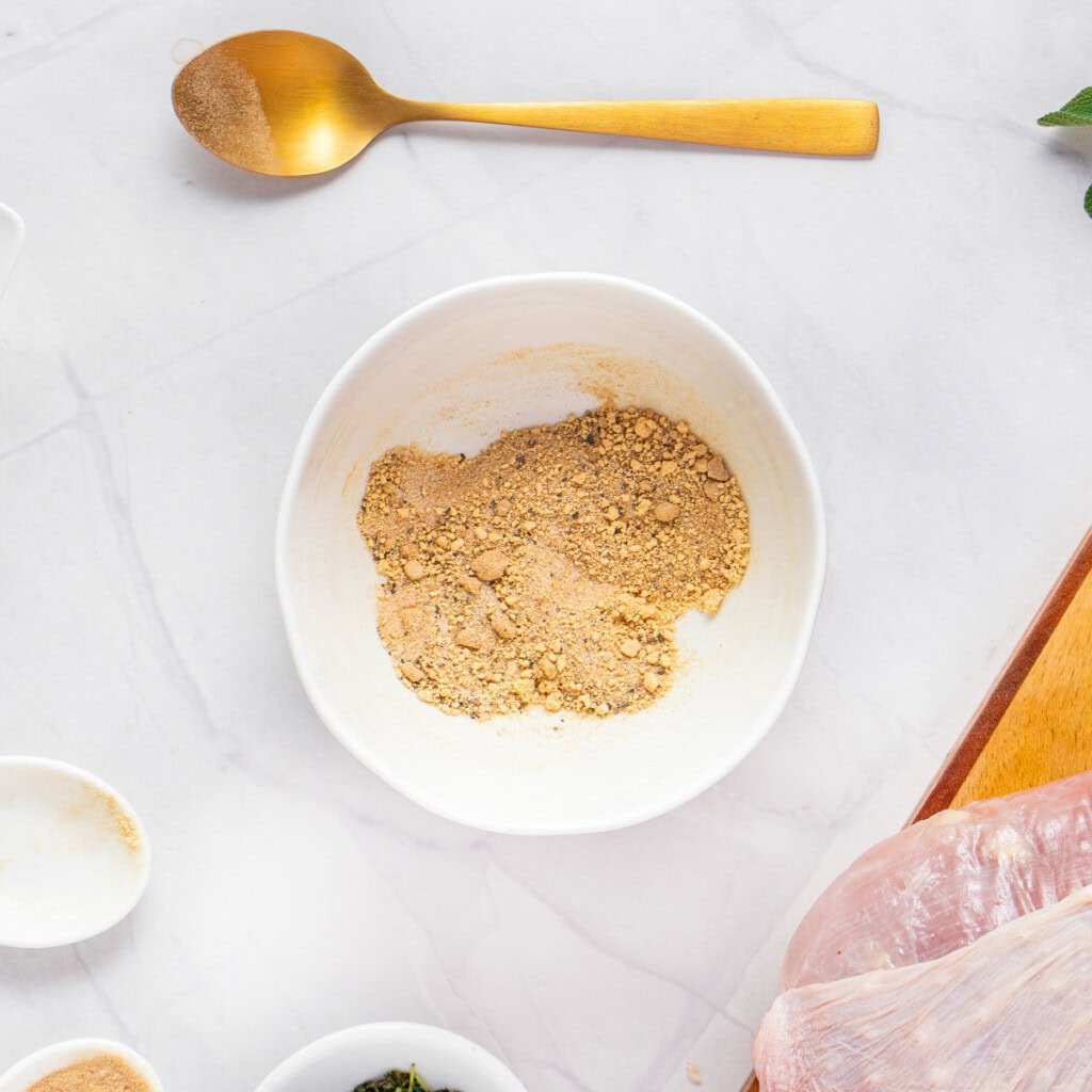 Seasonings combined in white bowl.