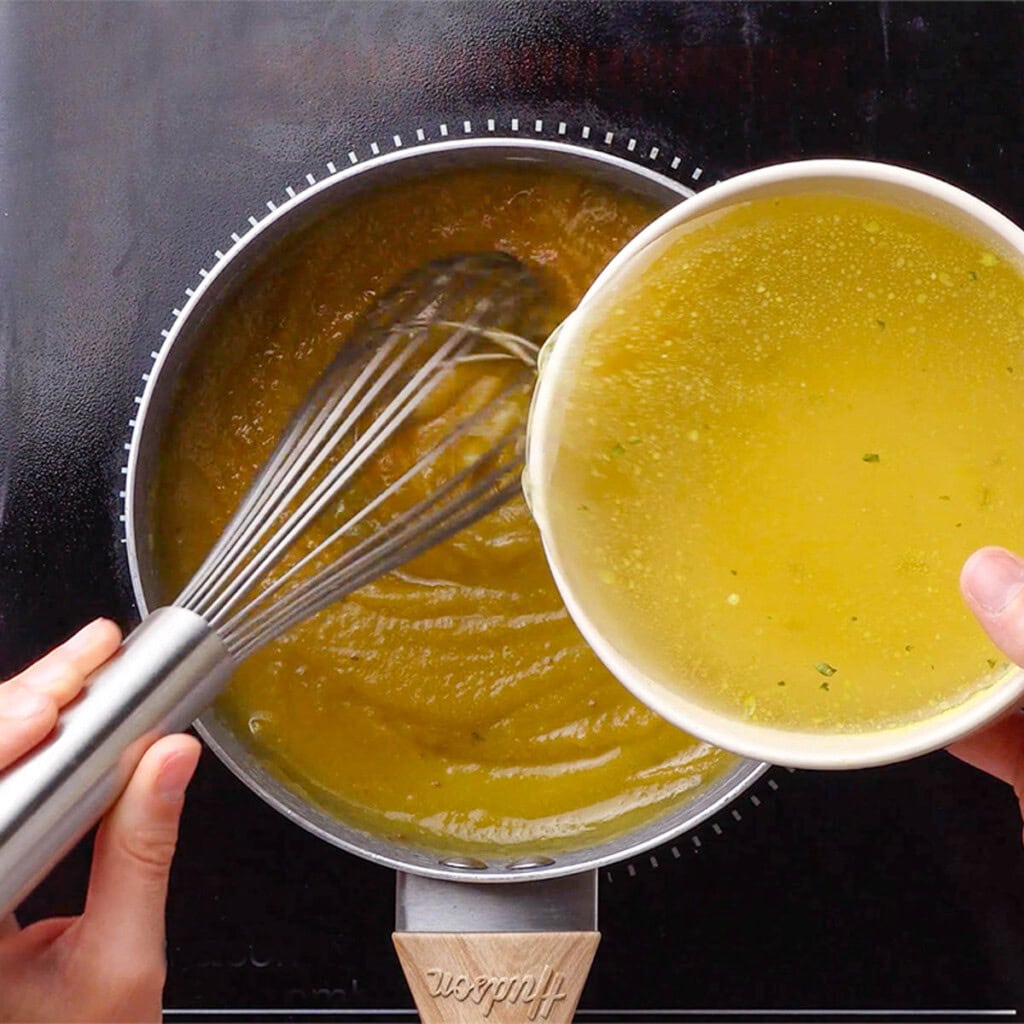 Adding broth to gravy recipe turkey.