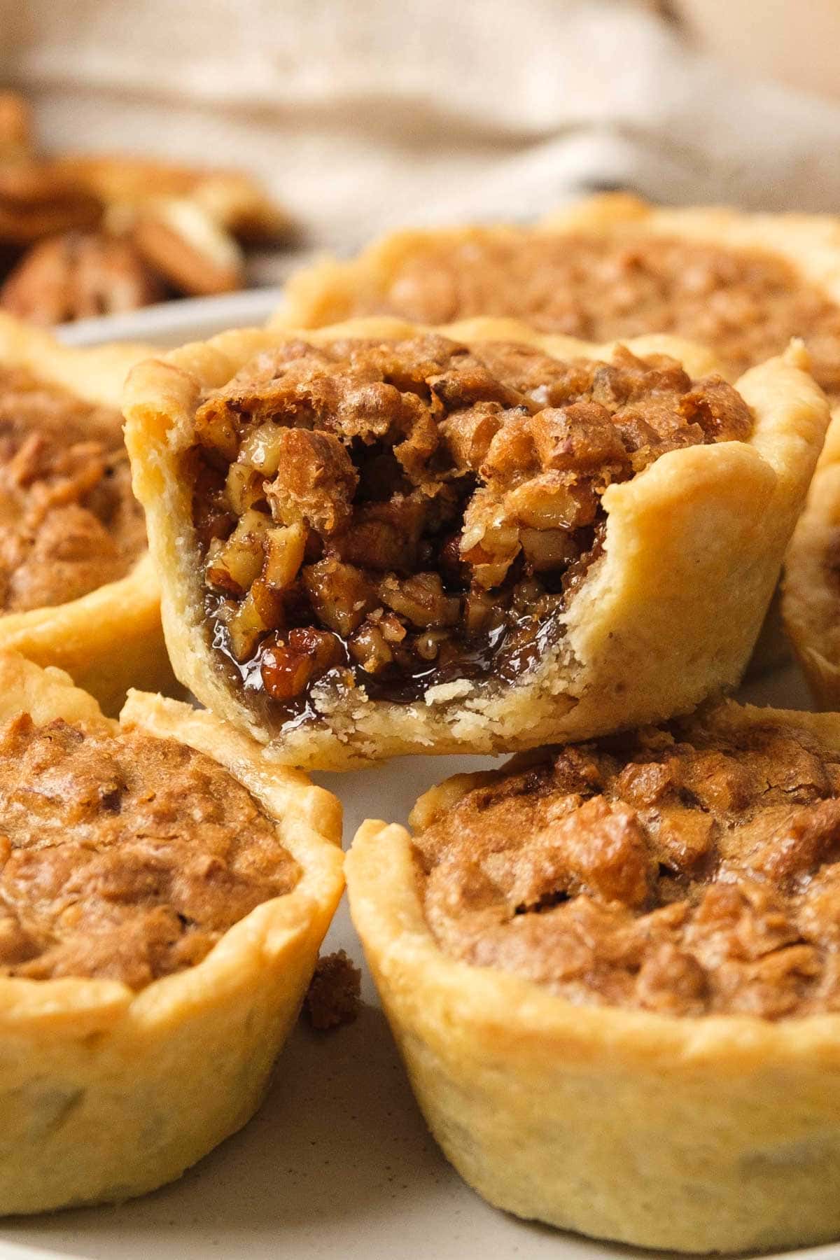 Mini Pecan Pie with missing bite.