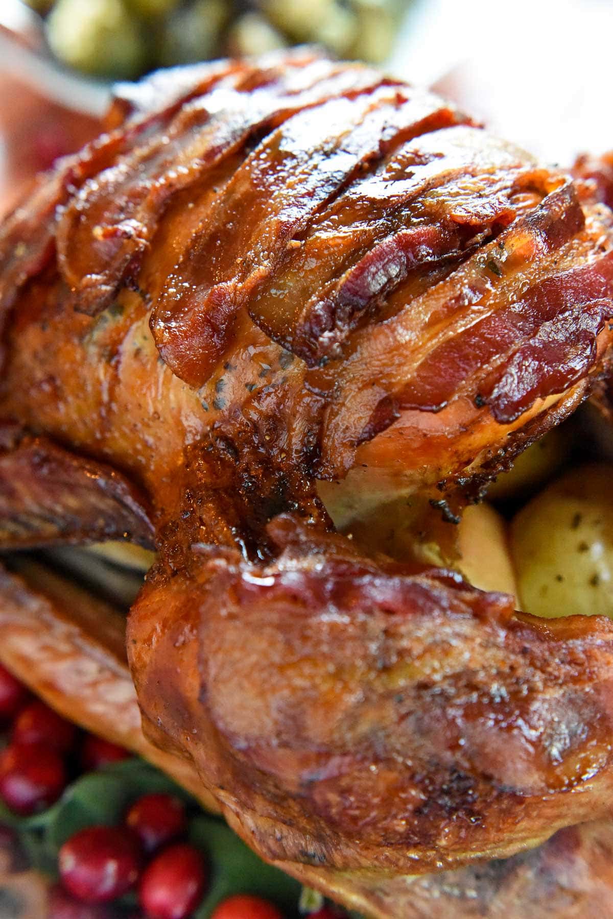 Close-up of bacon strips on Bacon Wrapped Turkey.