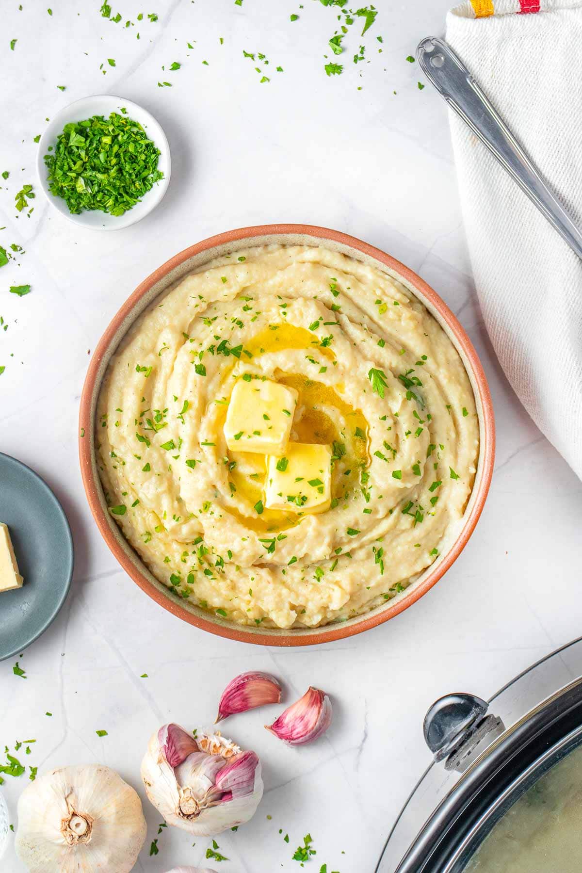 Aerial view of Crock Pot Mashed Potatoes in bowl.