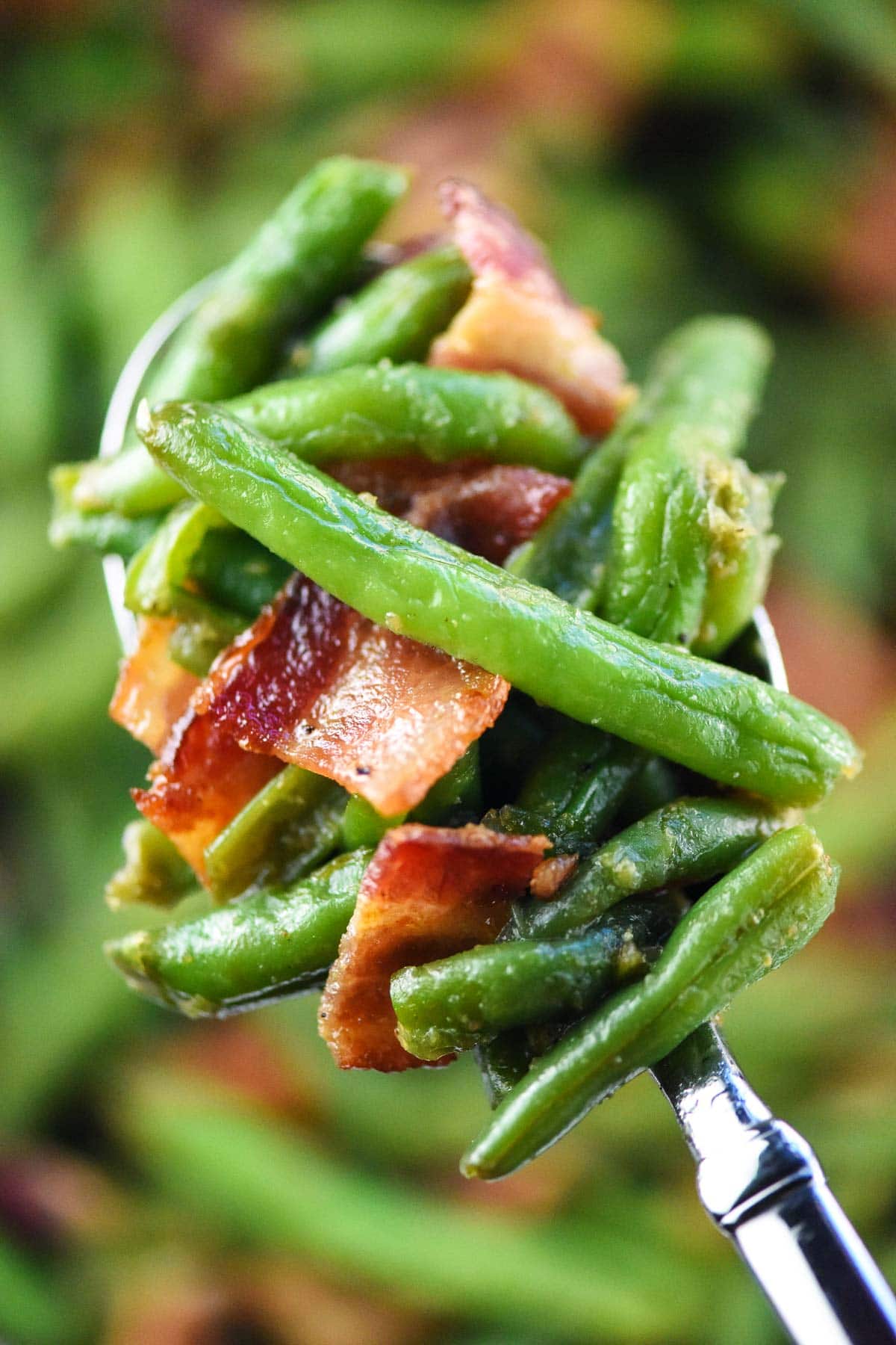 Green Bean Casserole with Bacon on spoon.