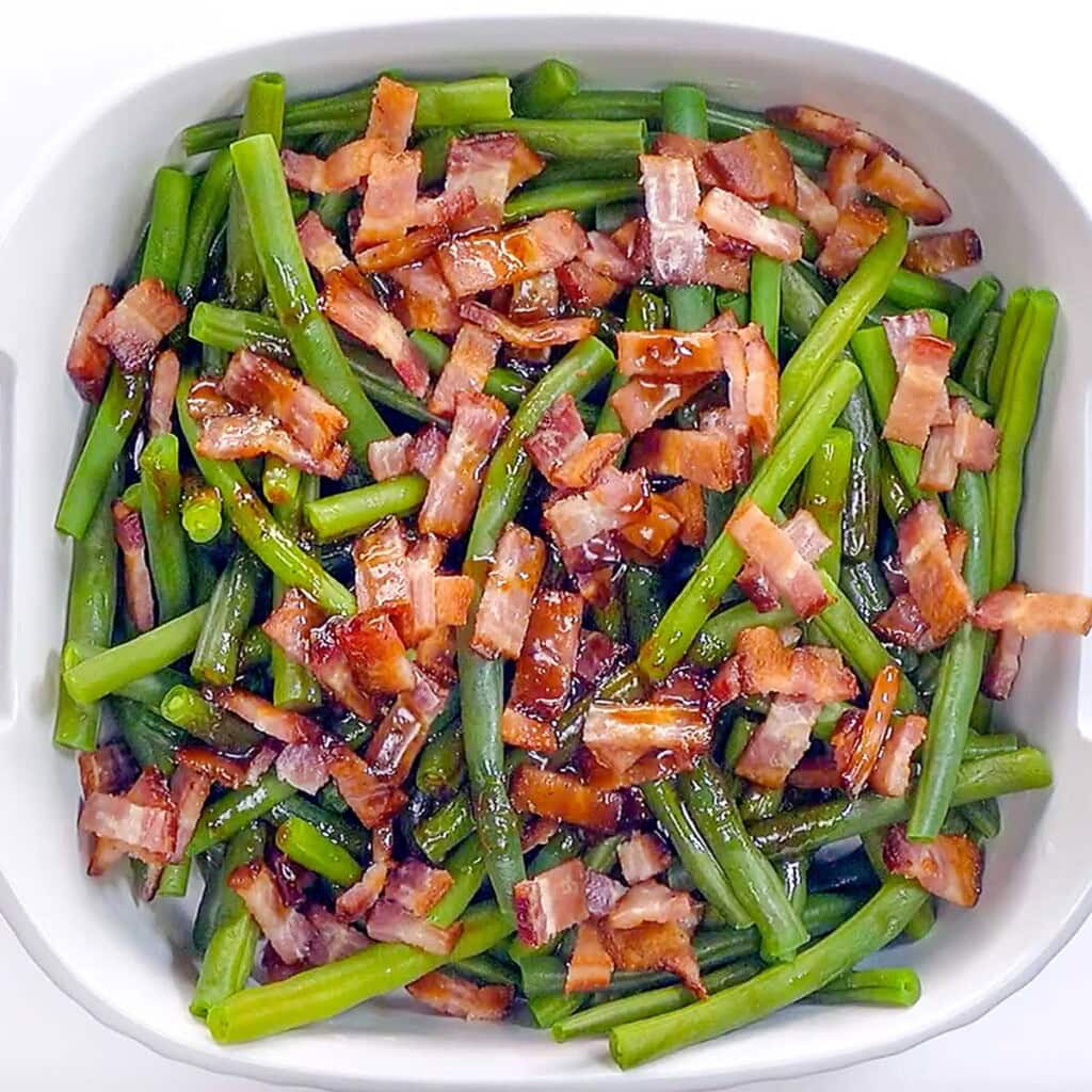 Green beans with bacon ready for oven.