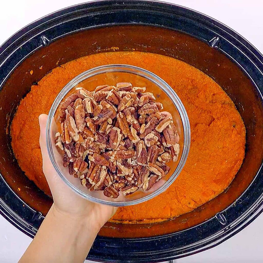 Ready to sprinkle toasted pecans over Slow Cooker Sweet Potato Casserole.