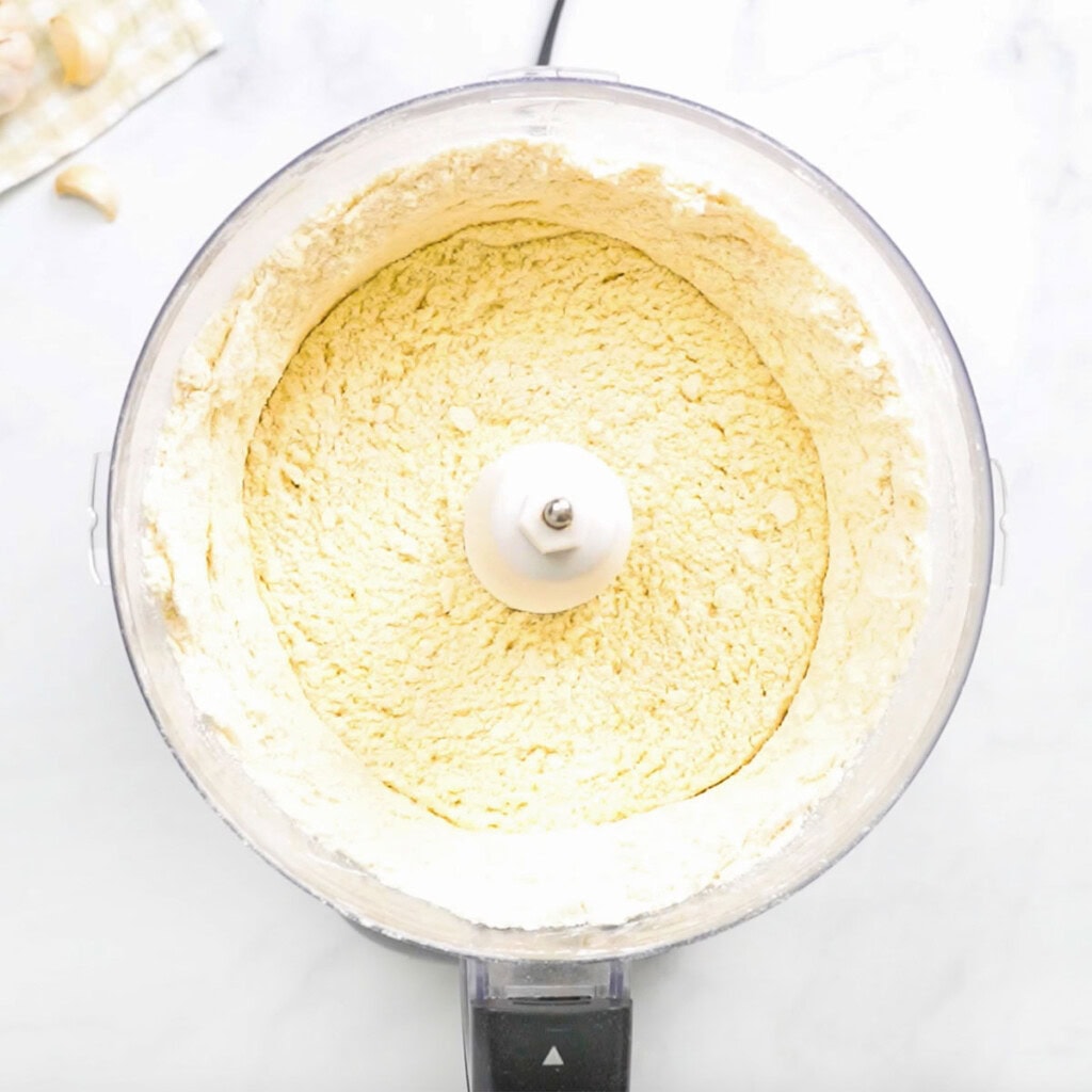 Butter and flour pulsed together in food processor.