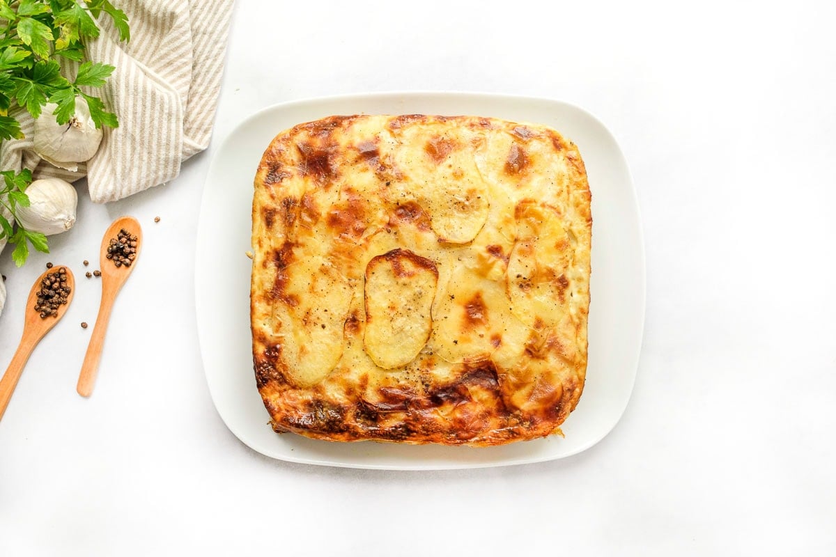 Gruyere Scalloped Potatoes on serving dish.