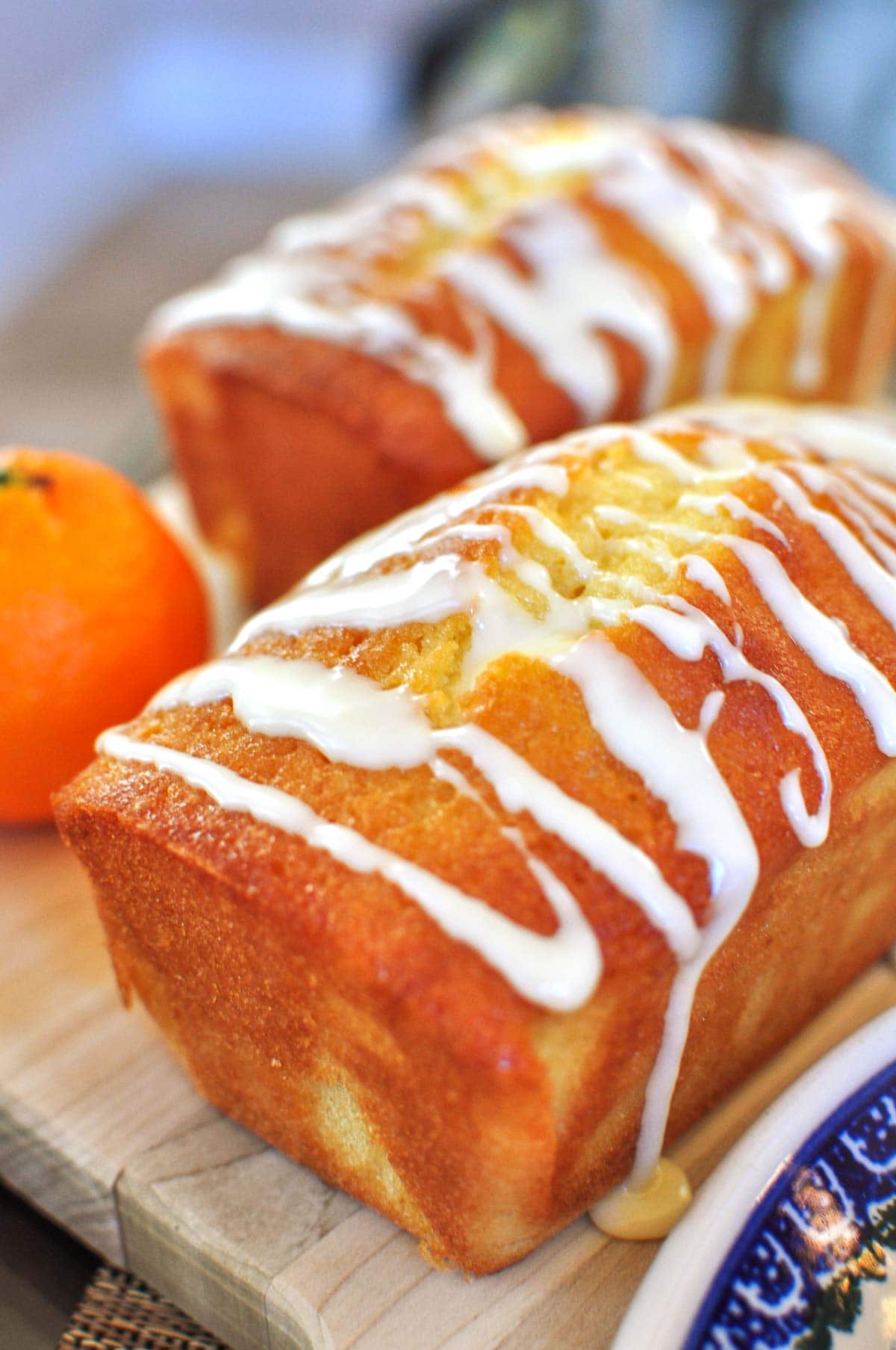 Orange Pound Cake recipe on wooden board.