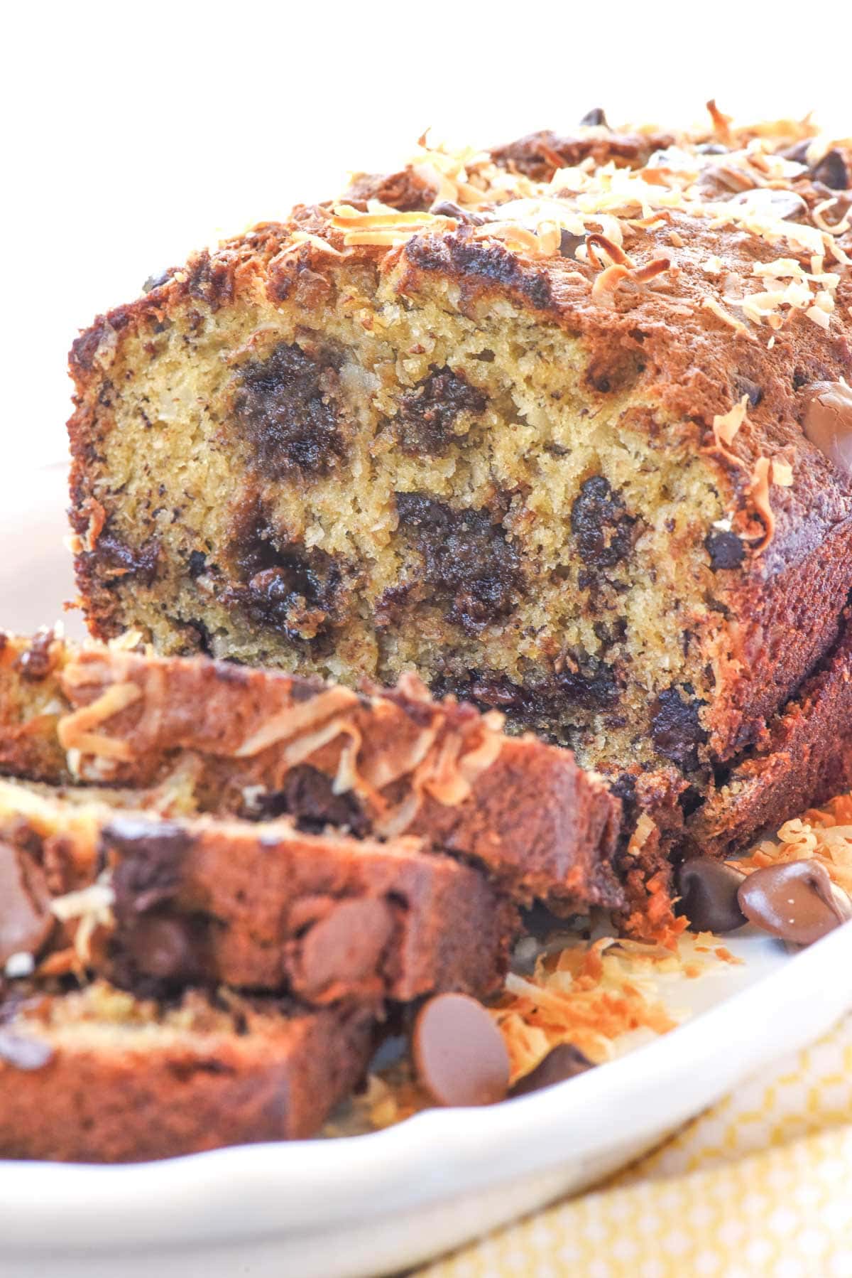 Chocolate Chip Banana Bread on white platter.