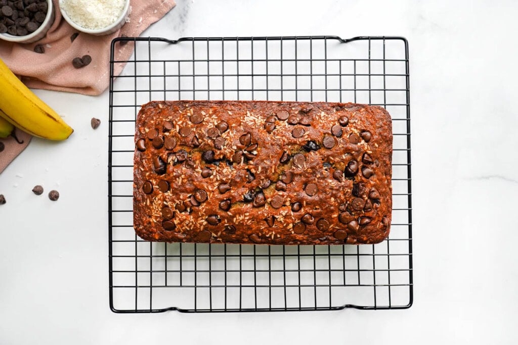 Chocolate Chip Banana Bread recipe on cooling rack.