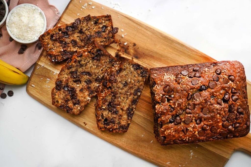 Chocolate Chip Banana Bread sliced on cutting board.