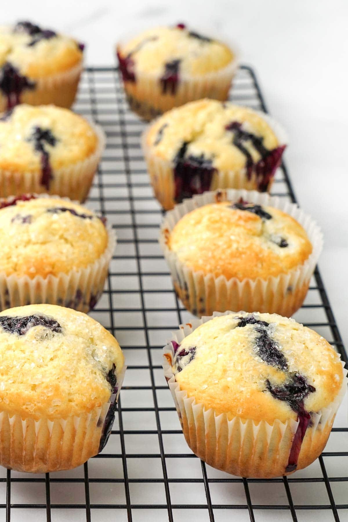 Easy Blueberry Muffins on cooling rack.