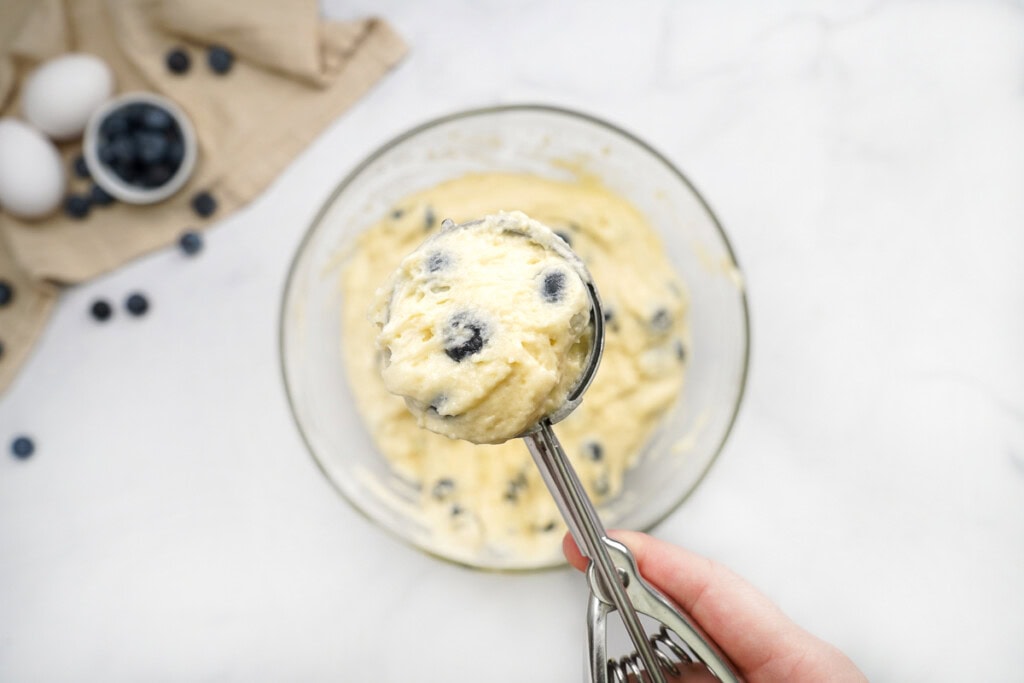 Cookie scoop full of blueberry muffins recipe easy batter.