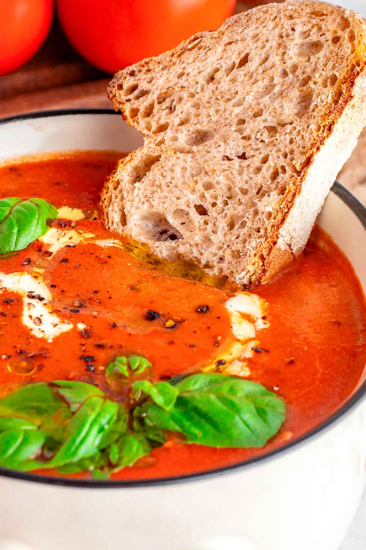 Bread dipped into Easy Tomato Soup recipe.