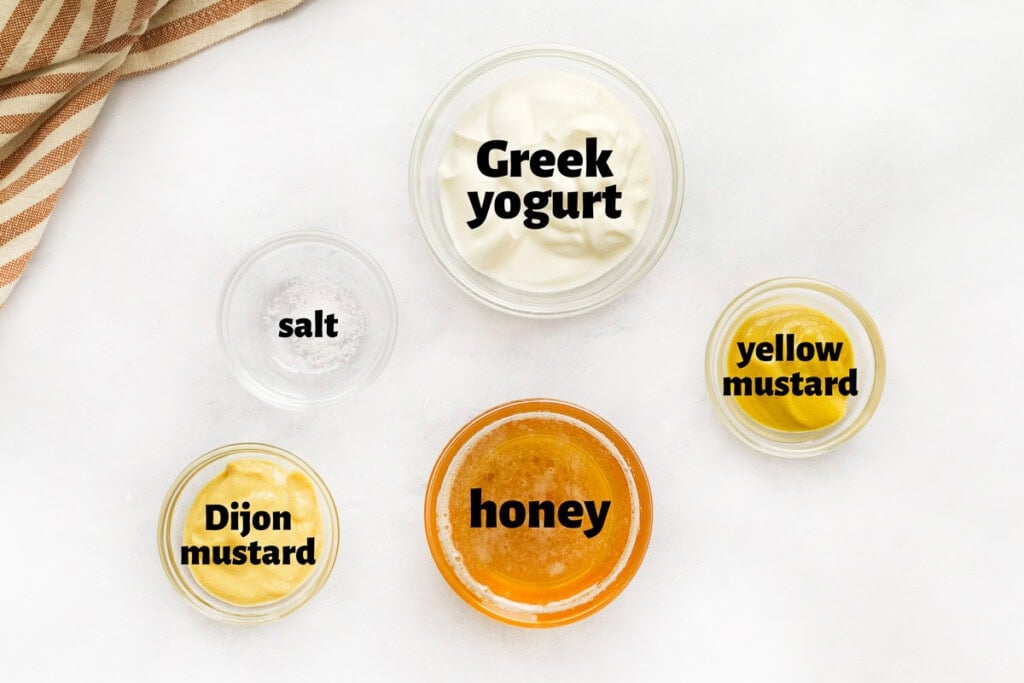 Labeled ingredients to make honey mustard recipe.