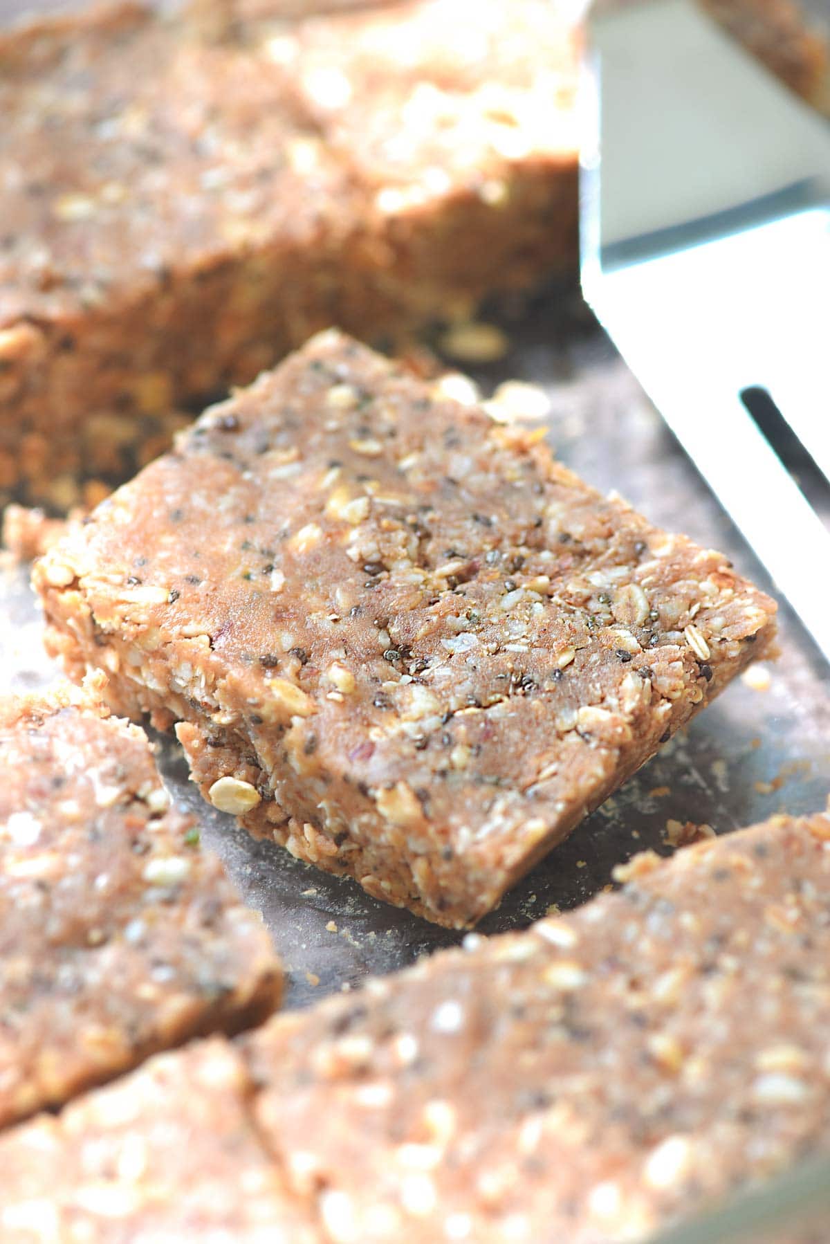 Protein Bars in dish with spatula.