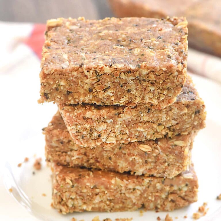 Protein Bars stacked on plate close-up.