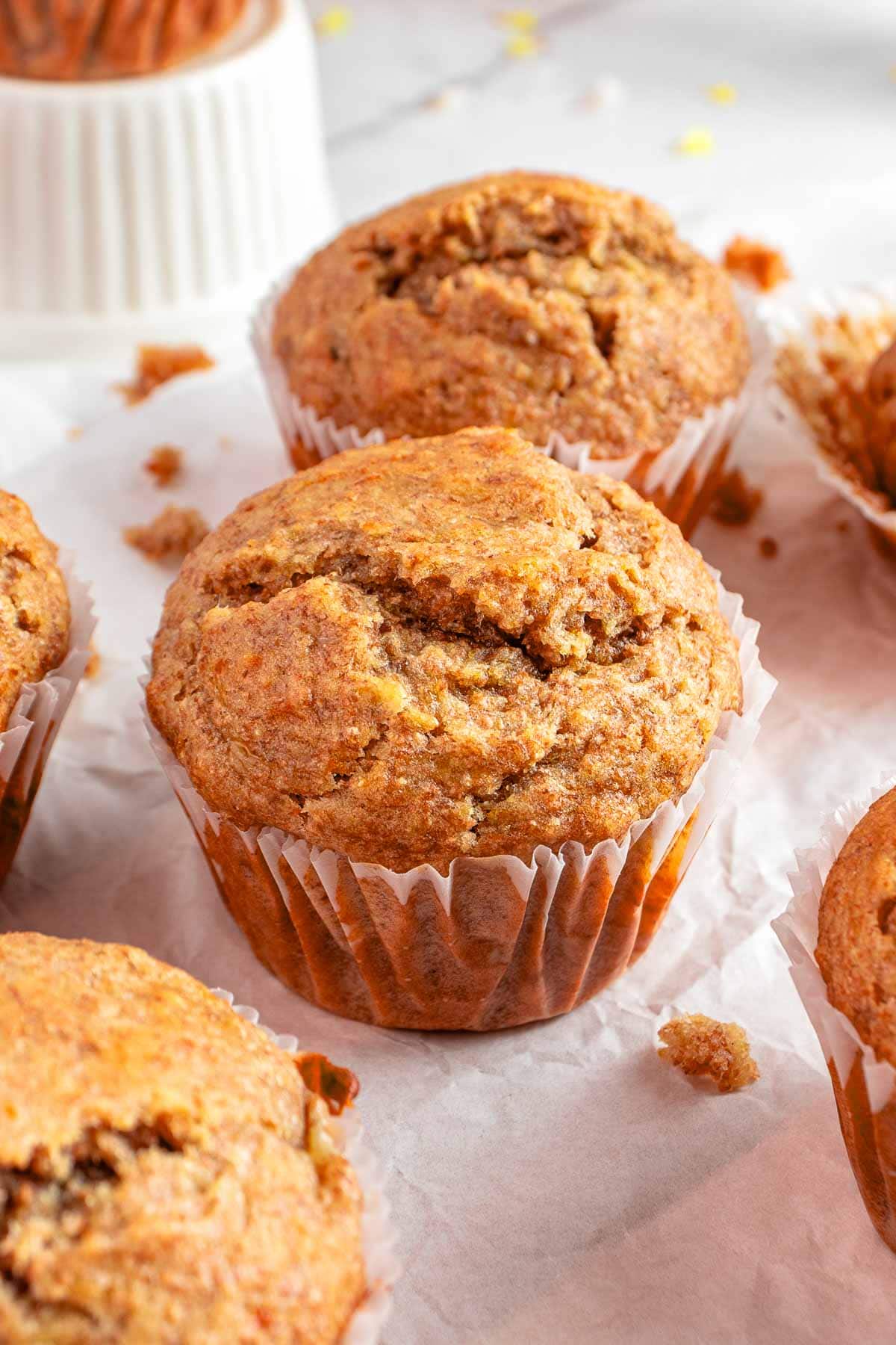 Healthy Banana Muffins recipe on table.