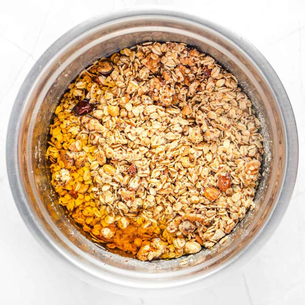 Adding honey to Protein Granola recipe.