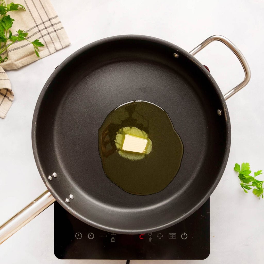 Butter and oil in skillet.