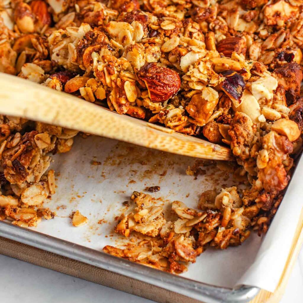 Scraping Protein Granola from bottom of pan.