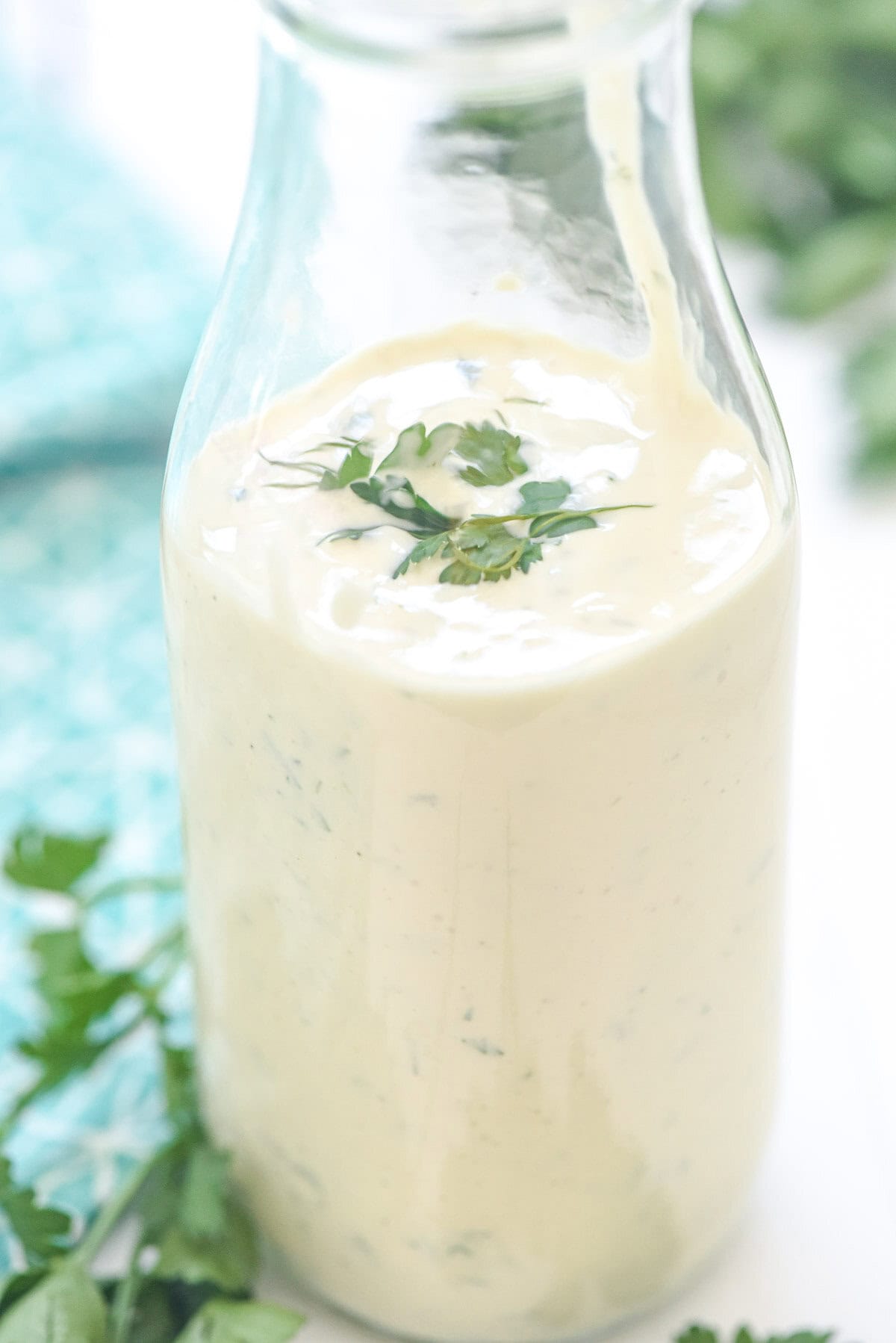 Homemade Ranch Dressing in glass bottle.