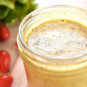 Homemade Italian Dressing recipe in jar close-up.